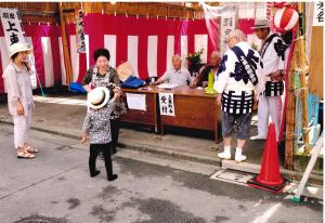 写真：久我　勝三さん作「祭りの日のお手伝い」（羽田）